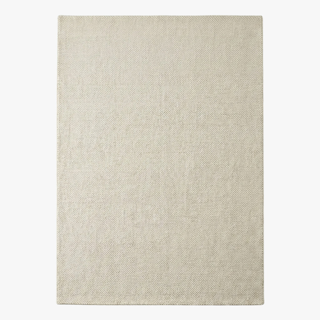 Beige rug on a white background