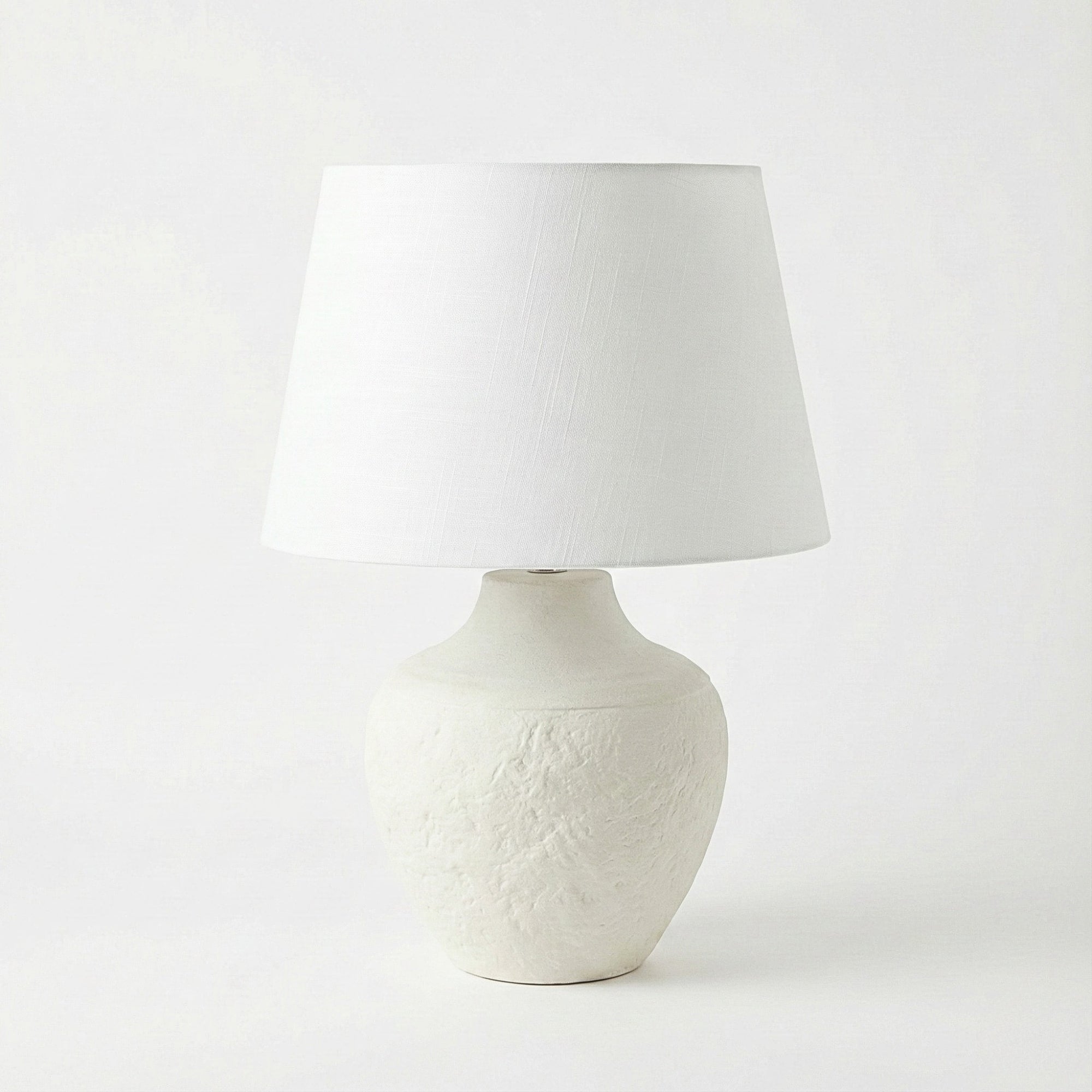 Luhpar Aria modern white ceramic table lamp with textured plaster finish and large white linen shade