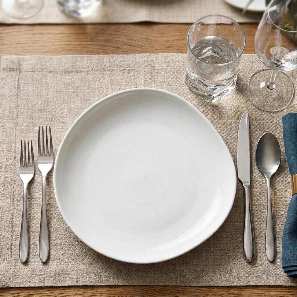Luhpar Pebble Collection white egg-shape plate, 9 inch — detail view