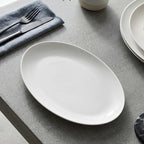 Luhpar Pebble Collection white organic oval plate, 14 inch — detail view