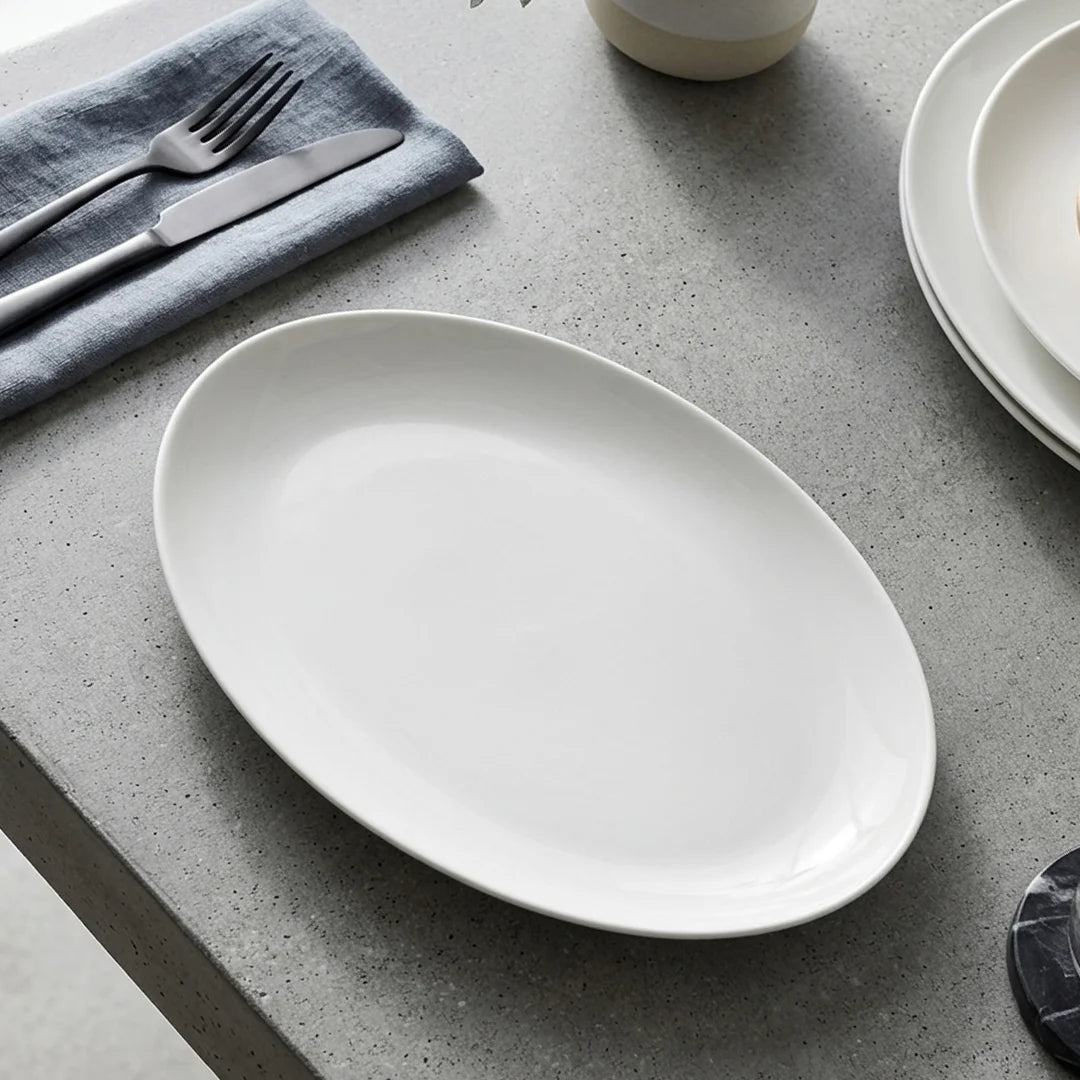 Luhpar Pebble Collection white organic oval plate, 14 inch — detail view