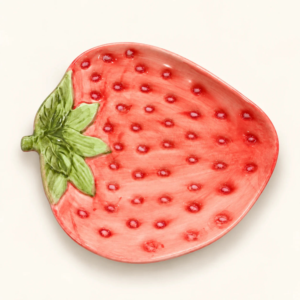 Overhead view of Berry Bloom strawberry-shaped plate with raised seed details