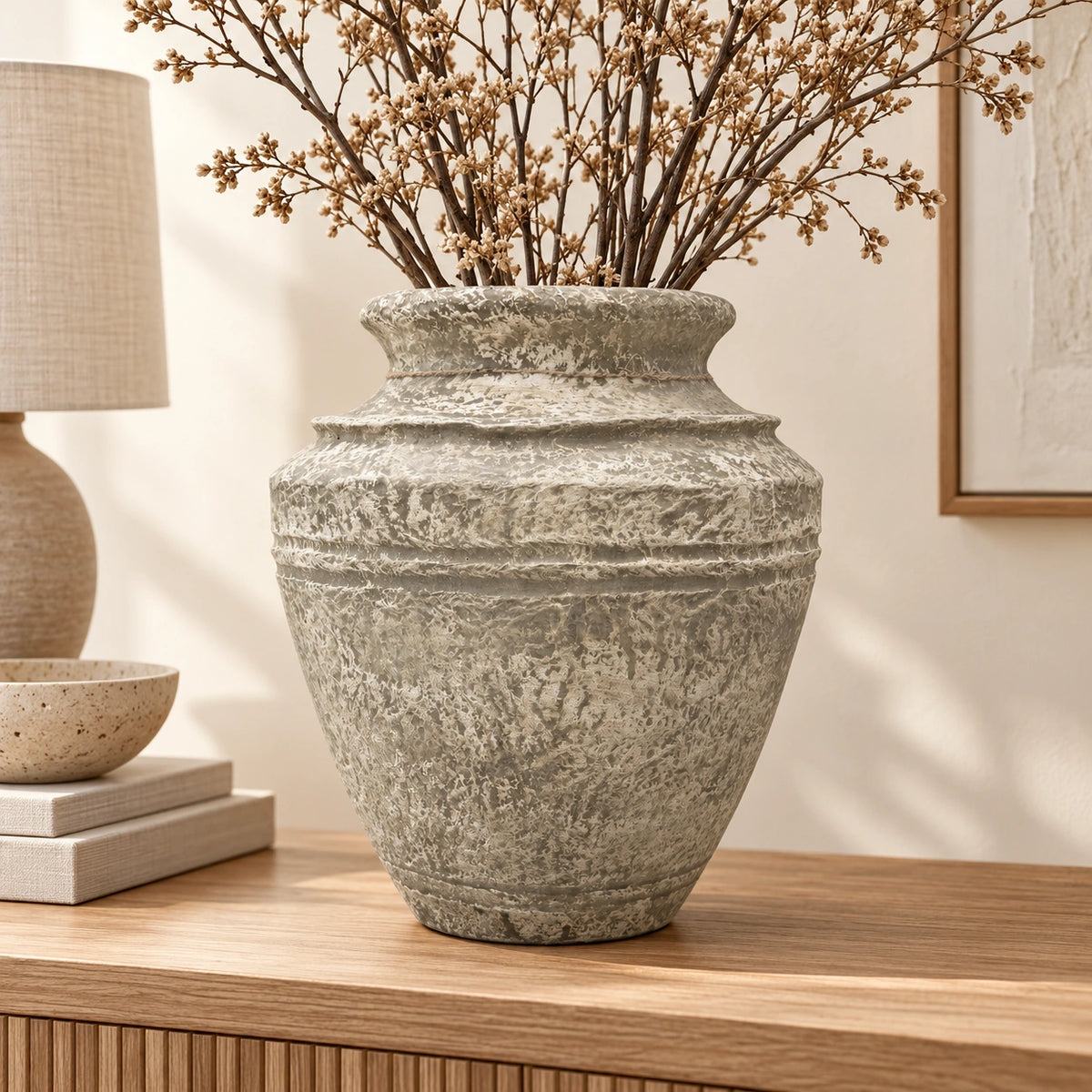 Stone effect papier-mache decor vase, 38 cm, styled with dried branches on oak console