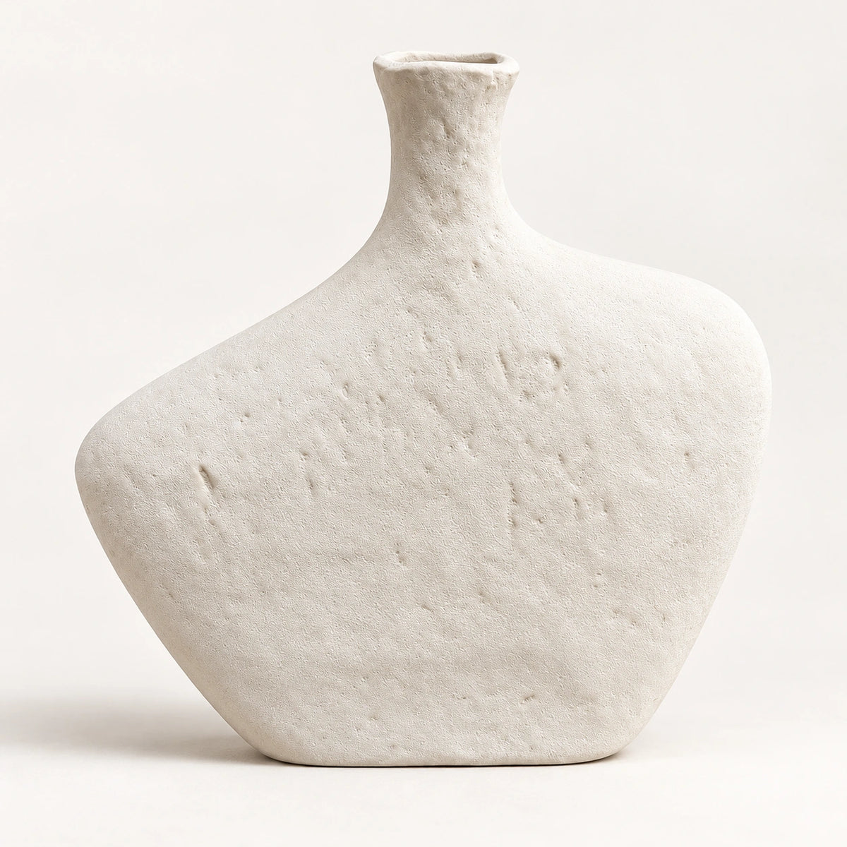 Off-white textured asymmetric oval decor vase, full front view