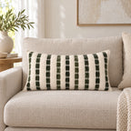 Full ivory and olive 27 x 50 cm cushion styled on a sofa
