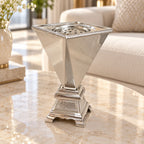 20 cm polished silver bakhoor incense burner with ornate pedestal on a marble side table