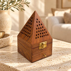 Wooden pyramid incense burner WLDJ-7128/M styled on a light stone console in a warm neutral living room